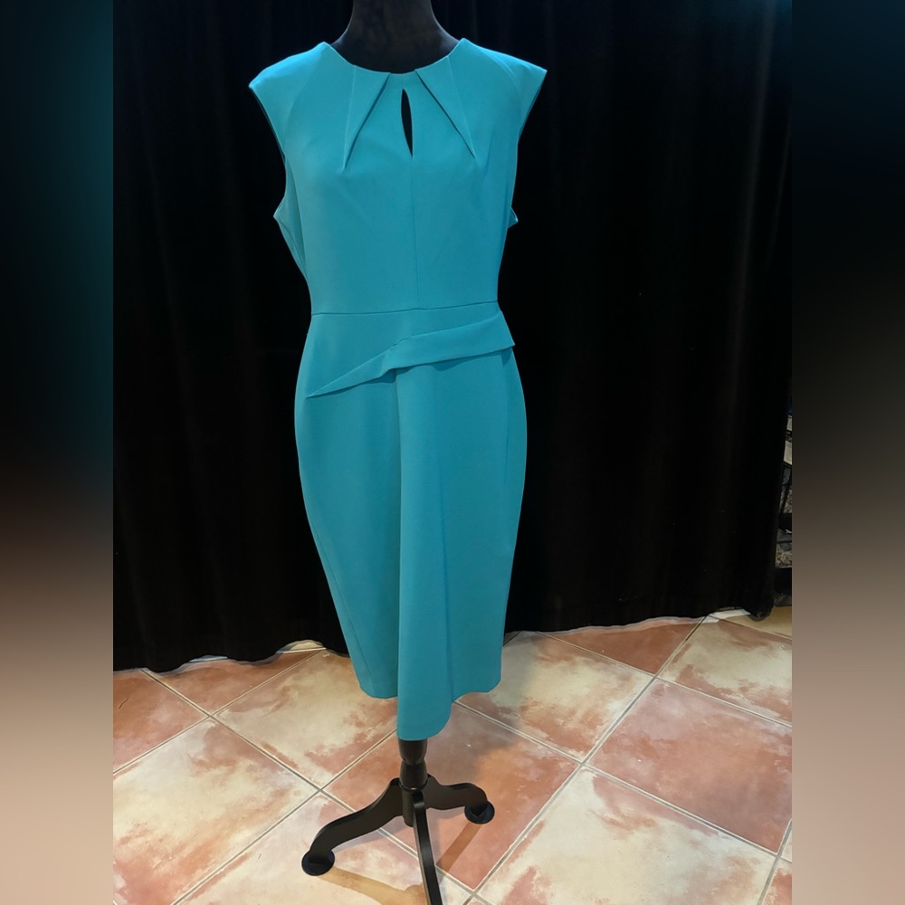 Turquoise dress with cleavage opening